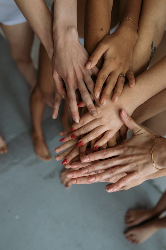 Women's hands together